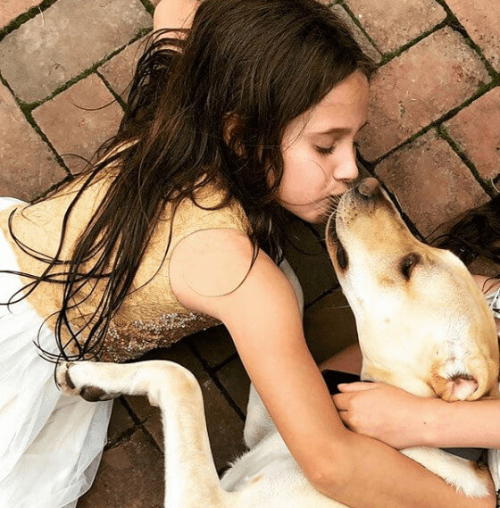 Carolina Regina Cuomo Kissing Her Dog